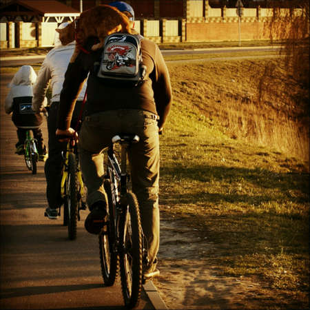 What is fitness  Family bike ride with catの素材