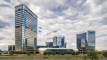 Modern complex of buildings made of glass, metal and concrete. Panoramaの写真素材