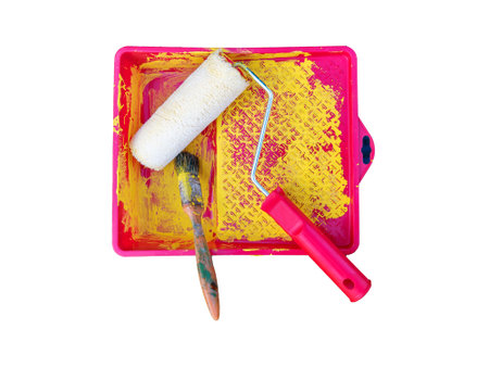 Paint brush and roller. Household supplies. Paint stains. Top view. Close-up on white background.の写真素材