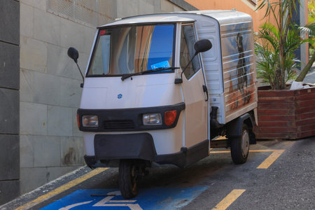 Piaggio Ape parked on steep hill in Puerto de la Cruz