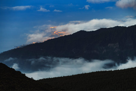 City lights through the clouds Teide, Tenerife