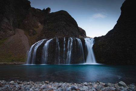 Stjornarfoss waterfall in Iceland at night summer time