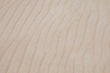 Sand Tekstur. Brunt sand. Baggrund fra fint sand. Sand baggrund