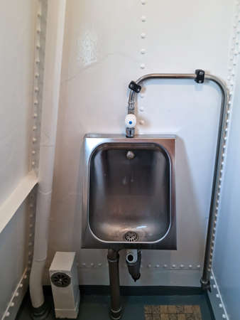 WC in boat - Bathroom in the old boat - small room antique interior.の写真素材