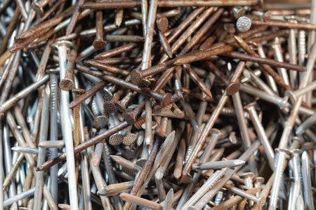 Various size rusty and new nails - nails oxidationの写真素材