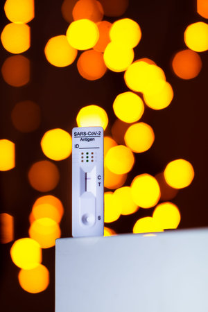 Negative corona test with a Christmas lights. Holidays infection - SARS-CoV-2