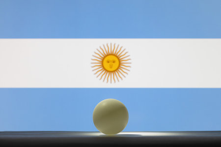 The ball stands on a surface in front of Argentina. World Table Tennis Championshipsの写真素材