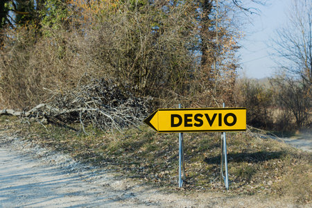 DEVISO - Diversion sign on the forest gravel road in a Spain shows to left.の写真素材