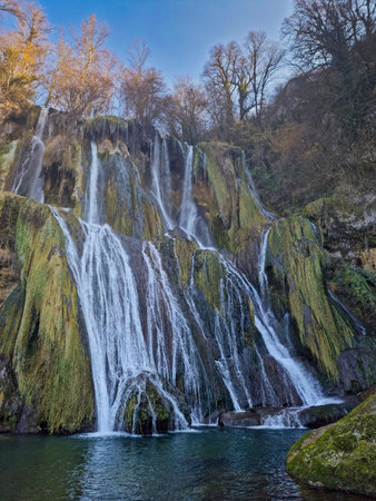 Glandieu waterfall in France - Cascade de Glandieu. It consists of two consecutive waterfall steps, for a total height of 60 meters, which carry the water of the Gland into the Rhone basin.の写真素材