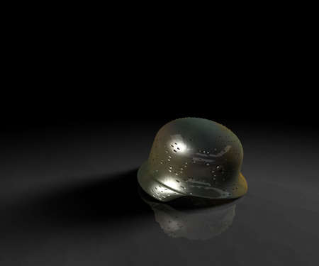 German world war II helmet laying on the reflective floor.の写真素材