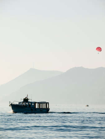 Tourist motor boat at sunset near Dubrovnik with other activitiesの写真素材