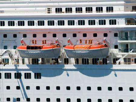Life saver boats on a big cruiser shipの写真素材