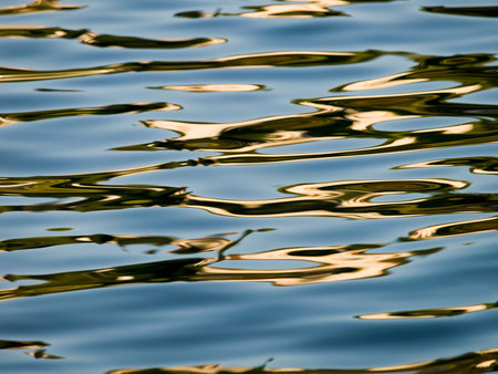 Reflection in the sea on small waves.