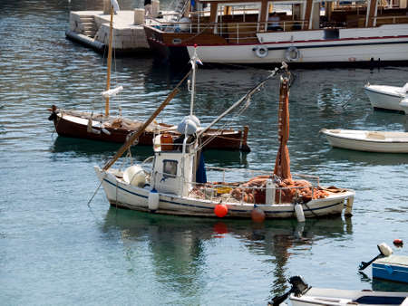 Fishing boat in Dubrovnik old town harbor.の写真素材
