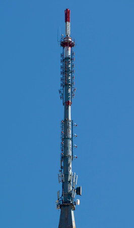 Telecommunication equipment on top of the hill with all broadcasting and receiving equipment....