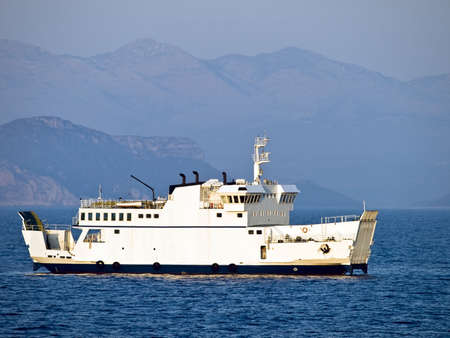 Ferry boat passing by on adriatic sea, Croatia near island Mljet.の写真素材