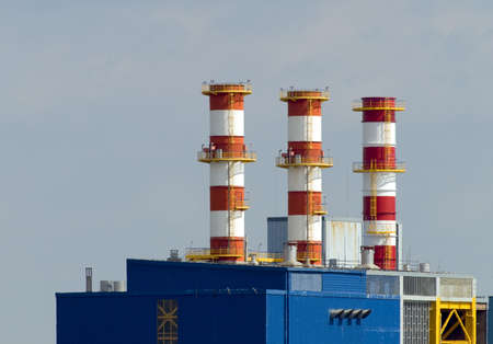 Heating and power plant against blue skyの写真素材