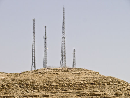 telecommunication antenna and equipment on the rocks