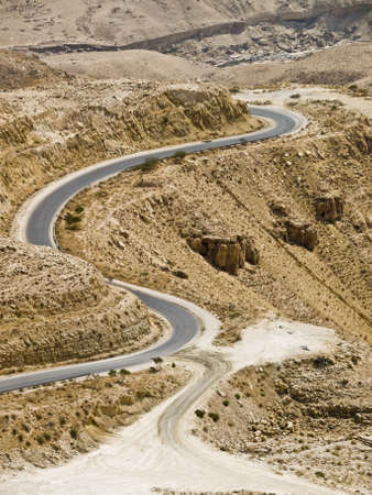Canyon landscape  in Jordan with road going downの写真素材