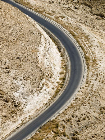 Canyon landscape  in Jordan with road going downの写真素材