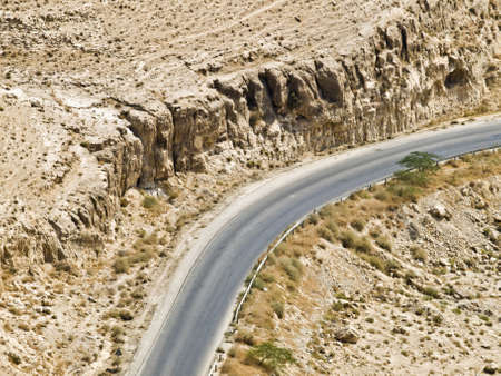 Canyon landscape  in Jordan with road going downの写真素材