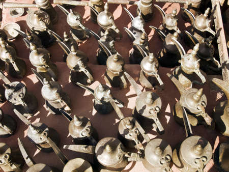 Selling arabic style coffee or tea pots on market in Jordanの写真素材