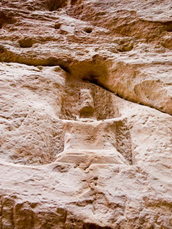 Nabatean place of worship (gods Dushara or al-Uzza)  in Petra (Al Khazneh), Jordan.  Carved in red rock. Ruins in the Siq canyon from Roman empire time.の写真素材