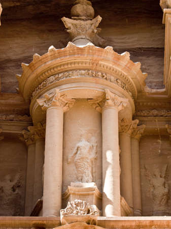 Treasury temple entrance facade detail of Nabatean temple or tomb in UNESCO site Petra (Al Khazneh), Jordan. Siq canyon.の写真素材