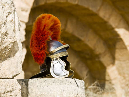 Roman Legionar's helmet on the wall with arches in Jerash, Jordanの写真素材