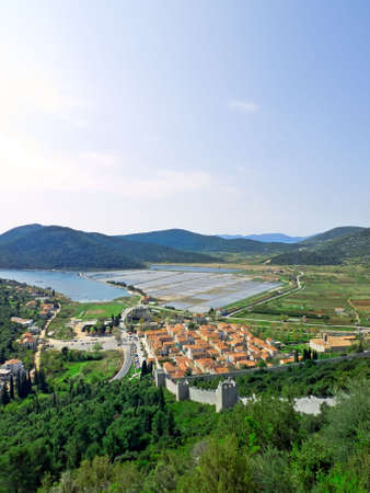 Second longest world walls. Ston small town near Dubrovnik, Croatia landscape in wide shot from top of the hill fortress.の写真素材