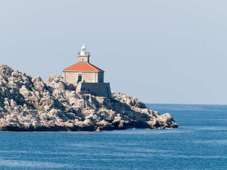 lighthouse on the rocky cay near Dubrovnik, Croatia, Mediterraneanの写真素材