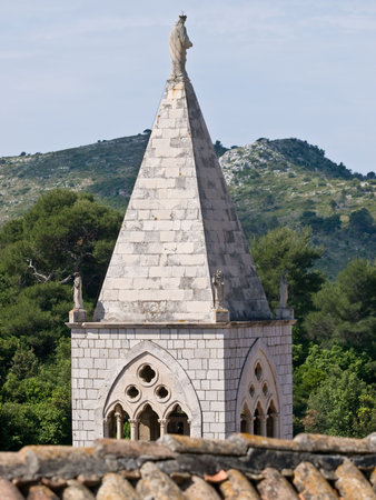 Church tower in village Lastovo, Croatiaの写真素材