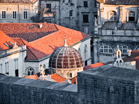 Dubrovnik old city walls details at sunset - sv Vlaho church dome.の写真素材