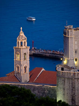 Dubrovnik old city walls details at night - city bell tower.の写真素材