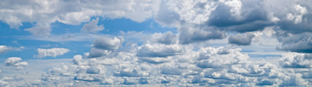 Cloudscape in banner format with sky full of clouds