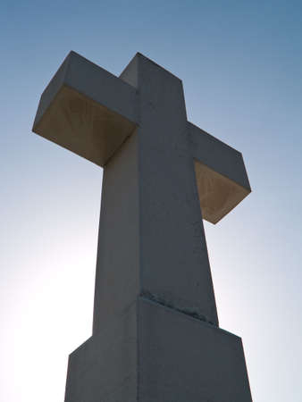 Big stone cross against a blue sky. Vukovar, Croatia locationの写真素材