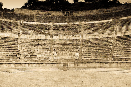 Roman amphitheater in Amman, Al-Qasr site, Jordan. Sepia and digital effect added.の写真素材