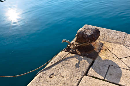 Harbor bollard detail in small village Hodilje near Ston on Peljesac peninsula, Croatia, Europe.の写真素材