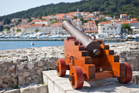Cannon at old fortress in medieval town Korcula. Croatia, Dalmatia region, Europe.の写真素材