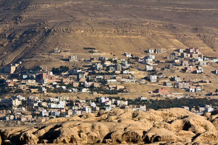 Petra - Nabataeans capital city (Al Khazneh) , Jordan. Bedouin new village in background at distance.の写真素材