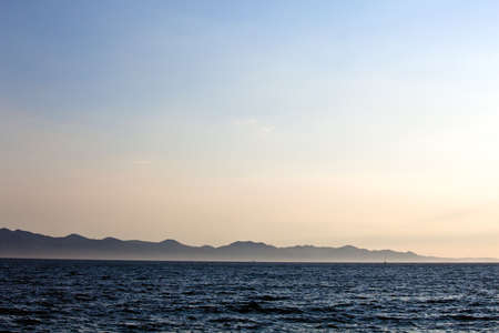 Adriatic sunset near Dubrovnik with Mljet island on the horizonの写真素材