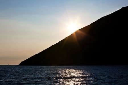 Adriatic sunset near Dubrovnik with Mljet island on the horizonの写真素材