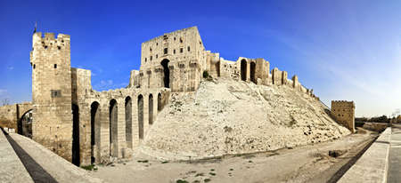Famous fortess and citadel in Aleppo, Syria. One of the oldest inhabited cities in the world. Entrance bridge.の写真素材
