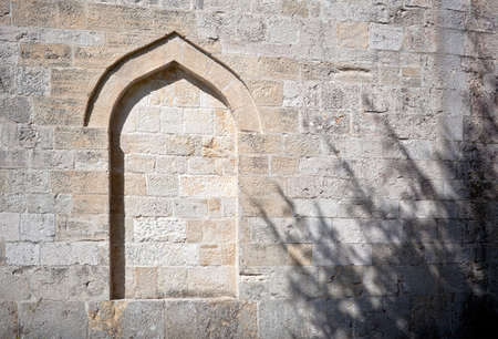 Old walled window on monastery wall, Visovac - Croatia from Turkish period - Ottoman Empire with dramatic shadow period - Ottoman Empire with dramatic shadowの写真素材