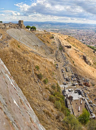 The Hellenistic Theater in Pergamon or Pergamum with a seating capacity of 10,000. With a view to the Bergama city.の写真素材