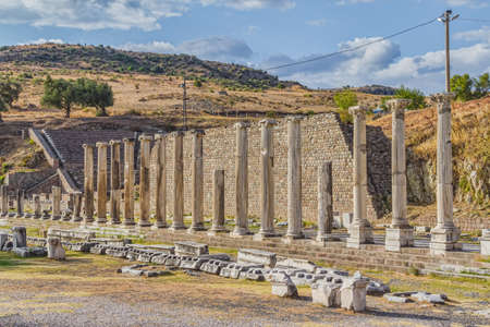 Street with colonnade infront of Theater in the Asklepion in Pergamon or Pergamum, Bergama, Turkey. It was something in between a sanctuary and a spa resort in Roman period.の写真素材