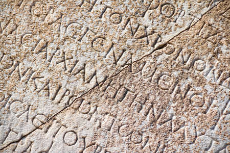 Detail with Roman inscription on latin language in Ephesus (Efes), Turkey.のeditorial素材