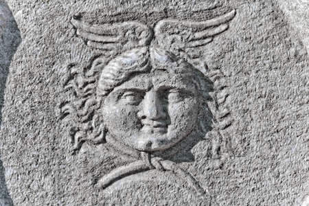 Roman sarcophagus relief detail with men head in Ephesus (Efes) from Roman time in Turkey.の写真素材