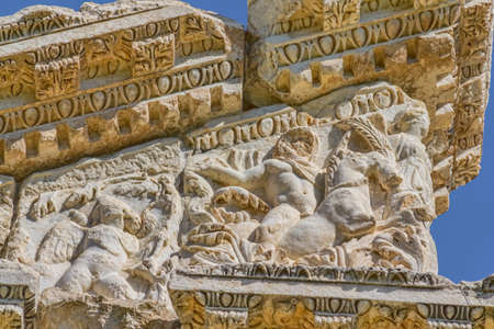 Relief detail on top of the Famous Tetrapylon Gate in Aphrodisias (Turkey) dedicated to Aphrodite built during Hellenic era. In Roman time it was a small city in Caria.の写真素材