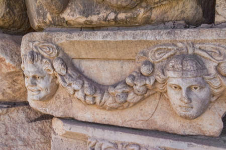 Building relief detail of architectural frieze in Aphrodisias (Turkey) build during Roman period.の写真素材